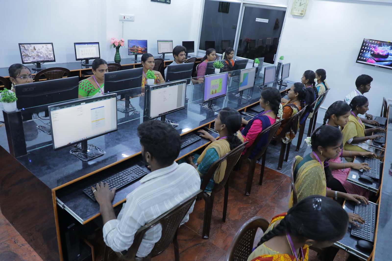 Female students with certificates